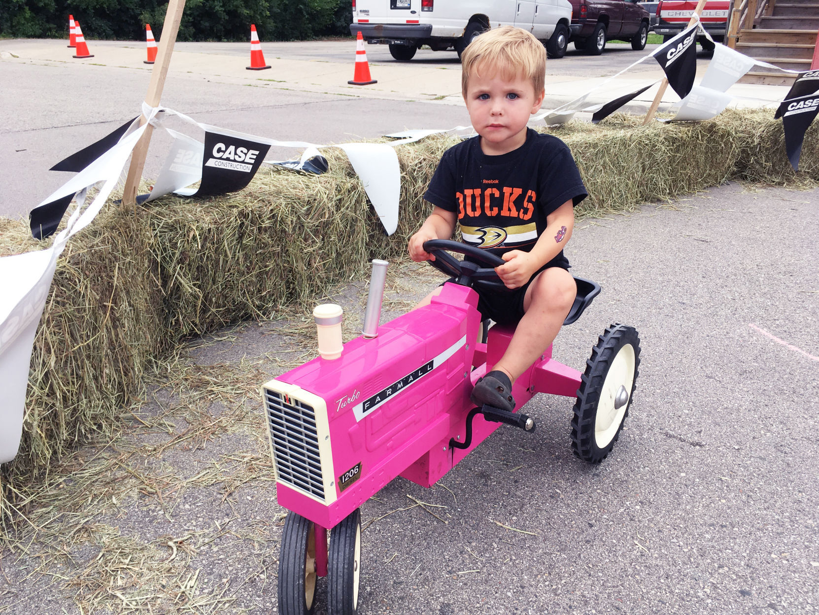 Liam Cook, 3, of Waterford, on a mini-tractor at Celebrate Waterford festival